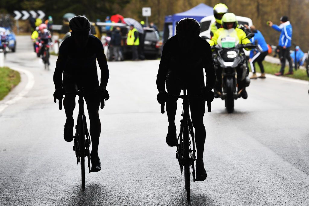 CORTINA DAMPEZZO ITALY MAY 24 Joao Almeida of Portugal and Team Deceuninck QuickStep Egan Arley Bernal Gomez of Colombia and Team INEOS Grenadiers Pink Leader Jersey in breakaway during the 104th Giro dItalia 2021 Stage 16 a 153km stage shortened due to bad weather conditions from Sacile to Cortina dAmpezzo 1210m Silhouette girodiitalia Giro on May 24 2021 in Cortina dAmpezzo Italy Photo by Tim de WaeleGetty Images