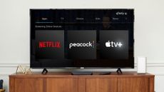 A screenshot of a TV showing the Comcast streaming bundle, which comprises Netflix, Peacock, and Apple TV Plus