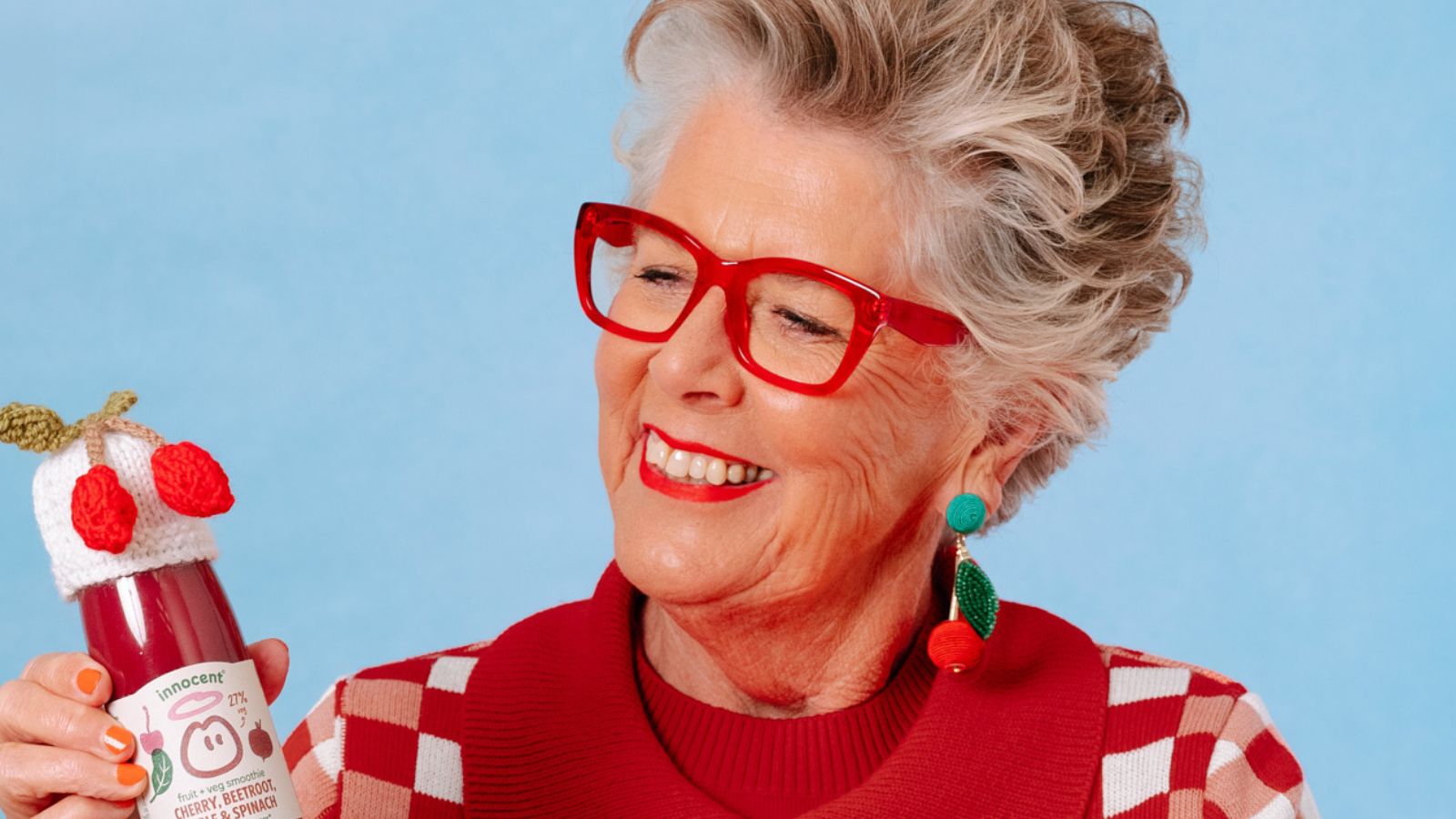 Prue Leith holding Innocent Smoothie