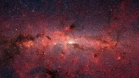 A reddish galactic scene