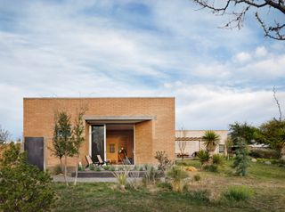 Daylight front facade shot of house in Marfa