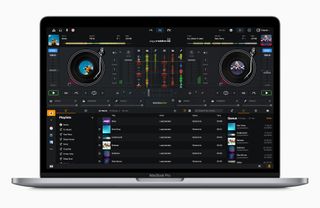 MacBook Pro with DJ software on the screen