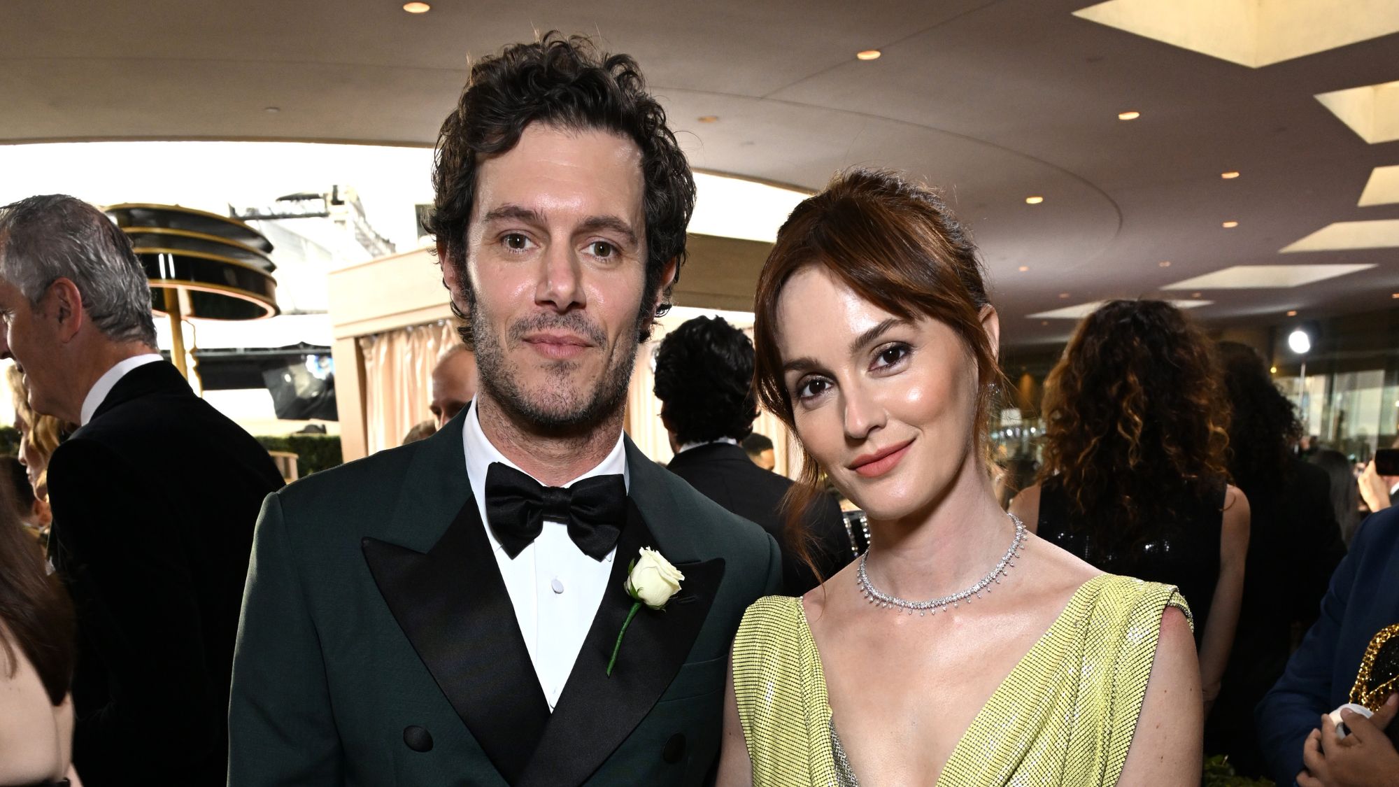 Adam Brody and Leighton Meester attend the 82nd Golden Globe Awards