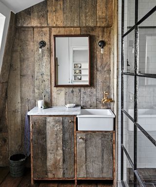 Bathroom with wood panelled walls