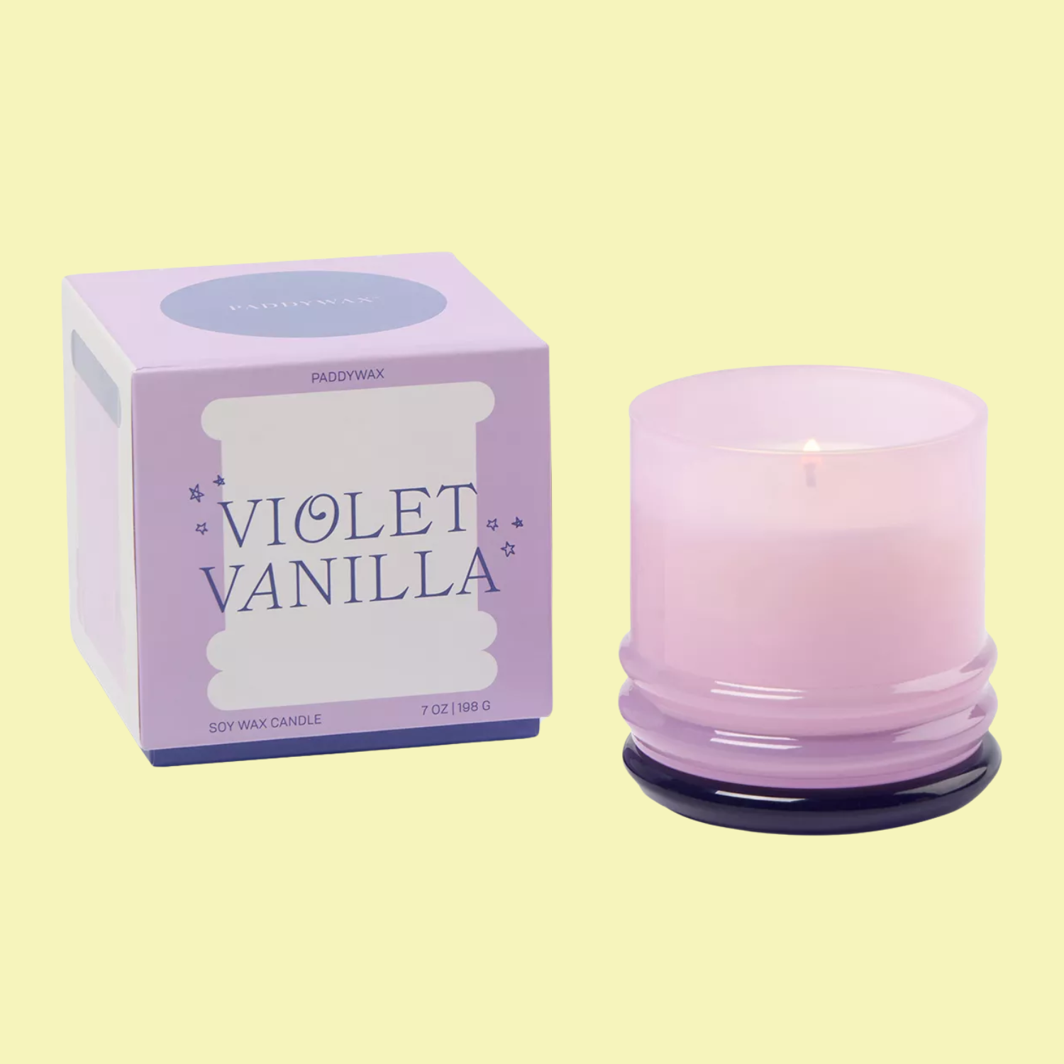 A lilac glass scented candle