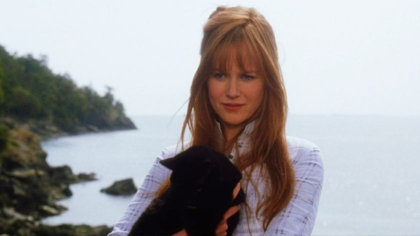 Nicole Kidman with a black cat in Practical Magic. 