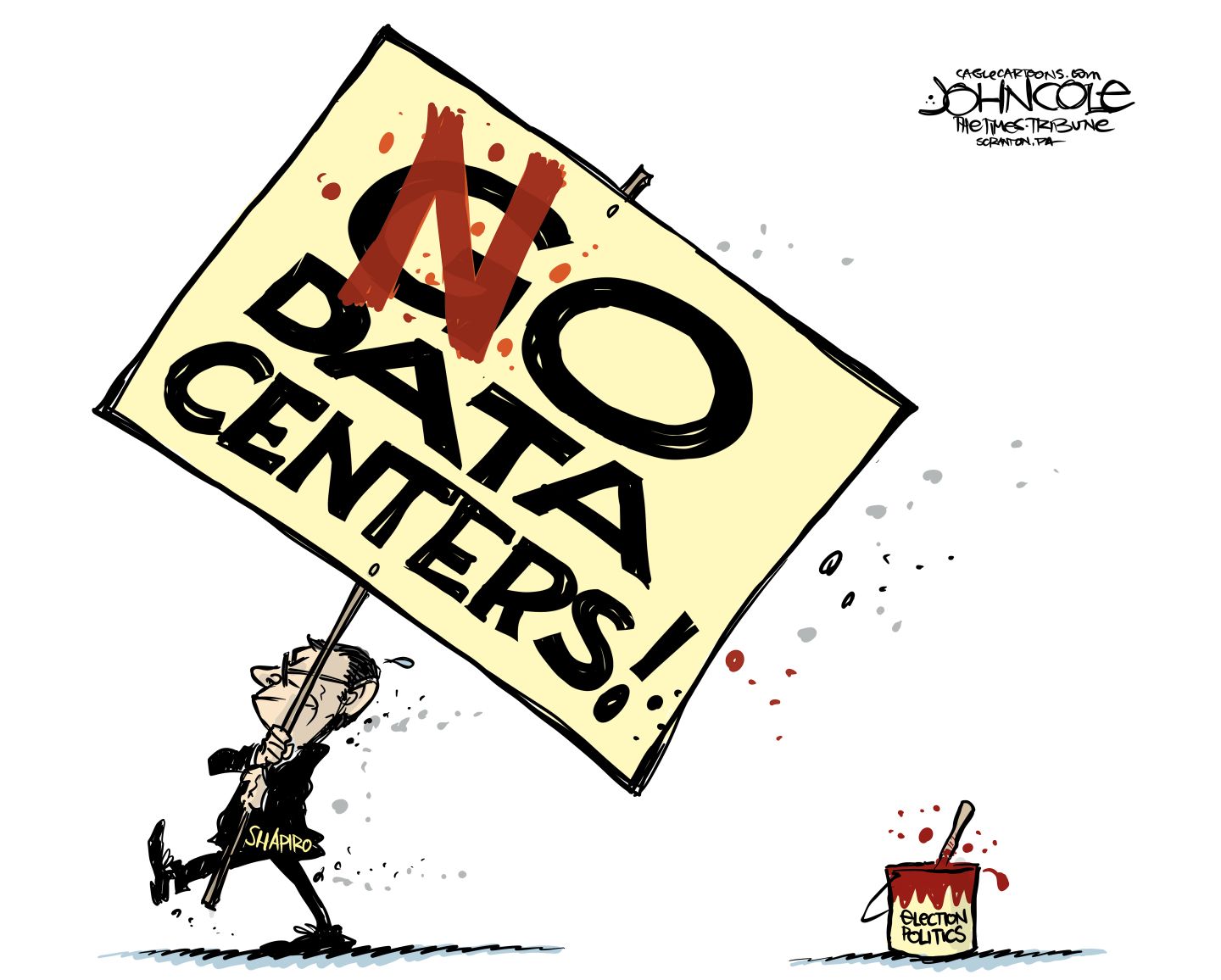 
                                Pennsylvania governor Josh Shapiro marches with a large sign that reads, “NO DATA CENTERS.” He’s used a can of paint labeled “election politics” to edit the sign, which used to read, “Go data centers!”
                            