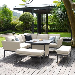 Large white outdoor sofa set with coffee table on patio