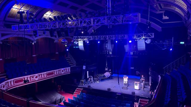 Chatham’s Central Theatre Bose loudspeaker setup with purple lights adorning the stage.