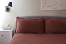 M&s red linen bedding on a bed in a bedroom
