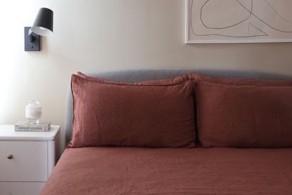 M&s red linen bedding on a bed in a bedroom