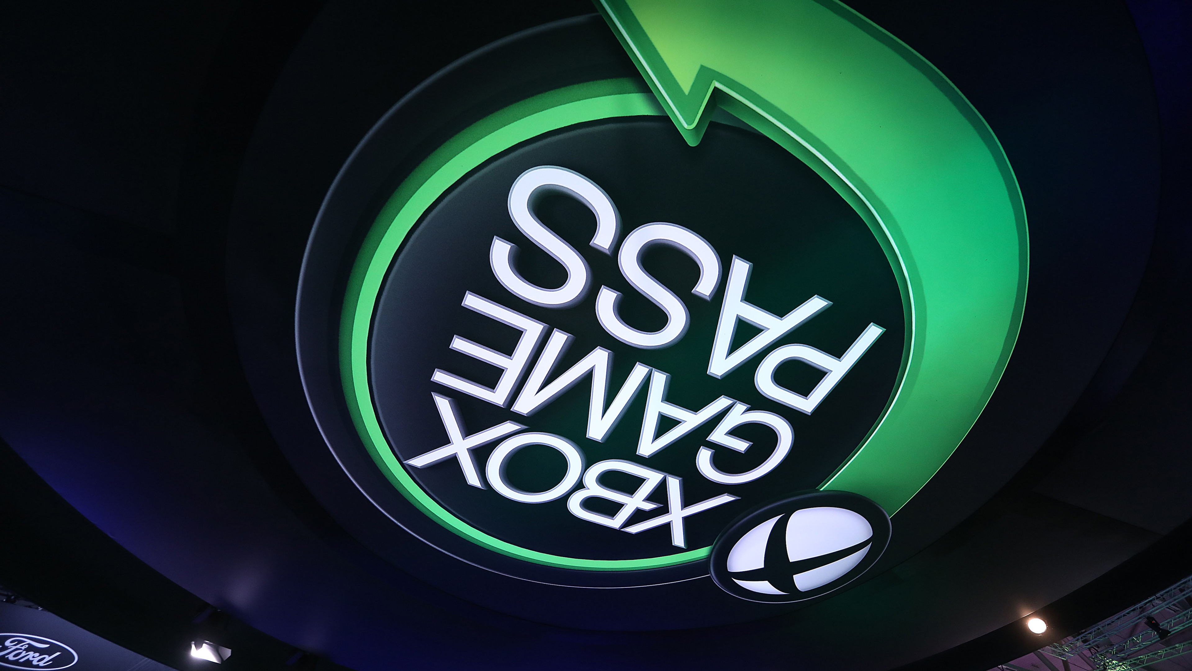 An illuminated sign for Microsoft Corp.&#039;s Xbox Game Pass gaming subscription service sits on the ceiling at the Gamescom gaming industry event in Cologne, Germany, on Tuesday, Aug. 20, 2019. Gamescom is the world&#039;s largest gaming convention and runs from August 20 to 24. Photographer: Krisztian Bocsi/Bloomberg via Getty Images