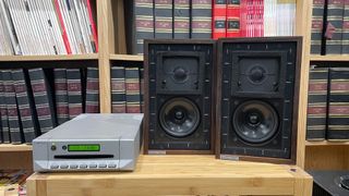Musical Fidelity LS3/5A speakers with Cyrus CDi player on wooden rack