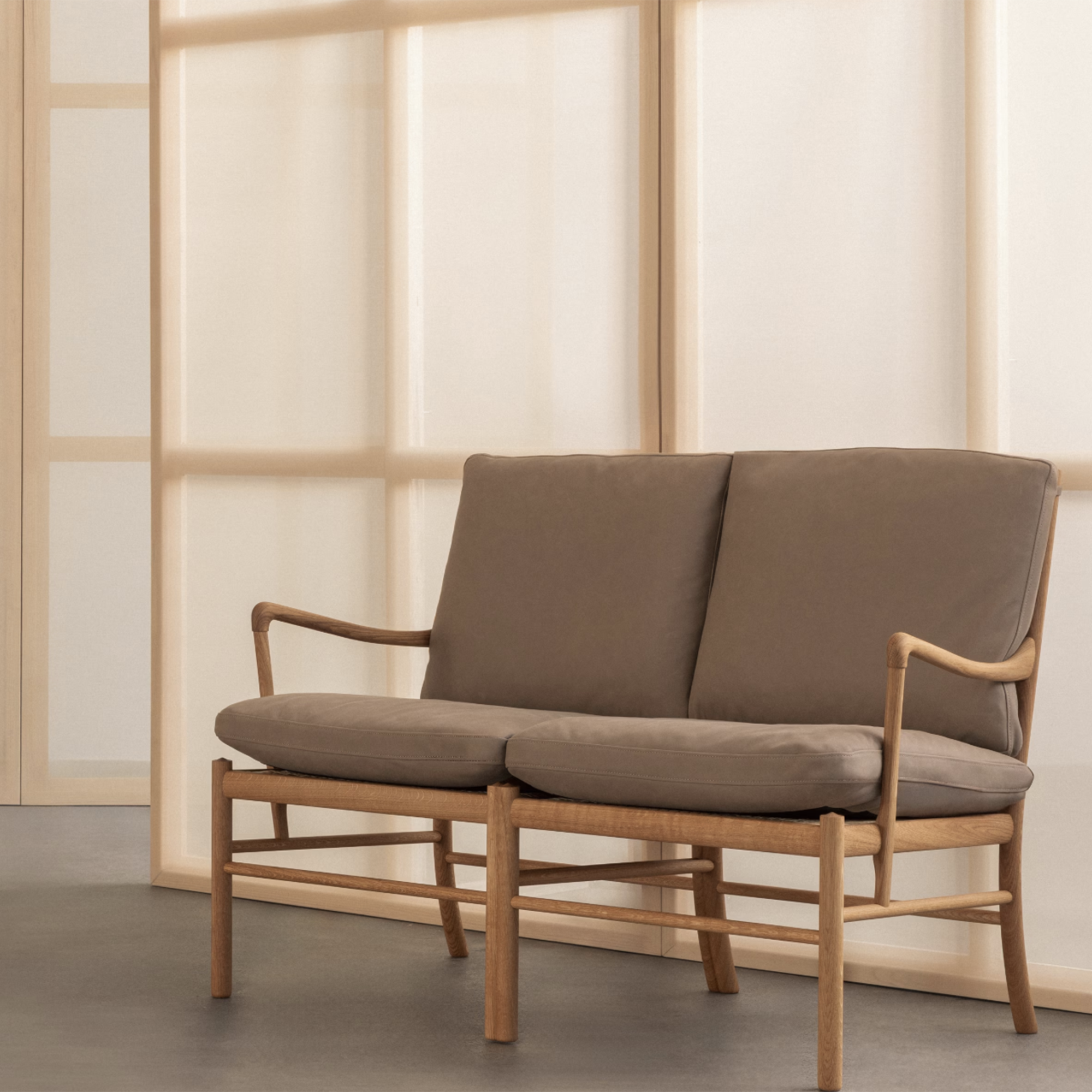 mid century sofa against a light wall