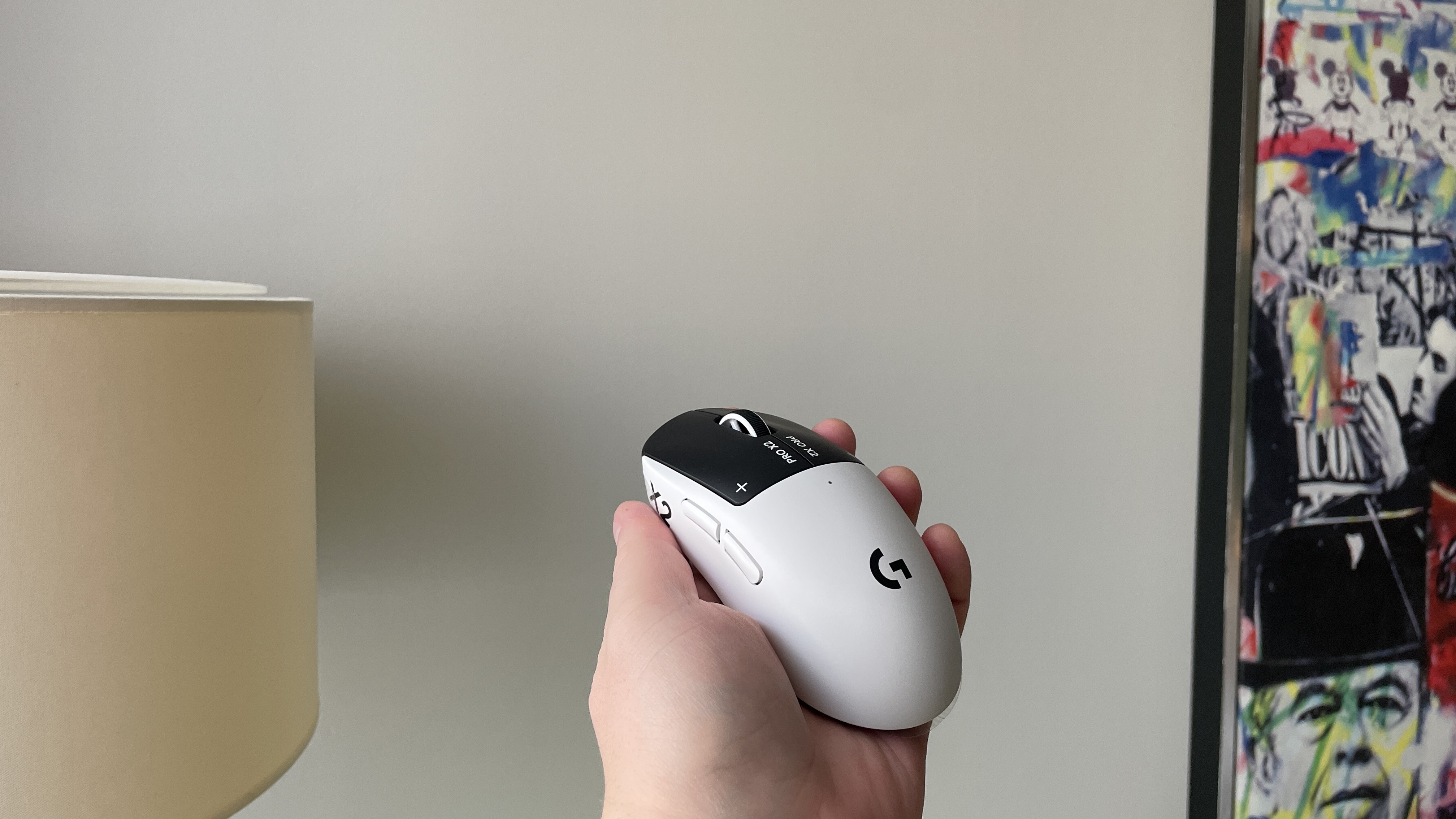 A Logitech G Pro X2 Superstrike gaming mouse.