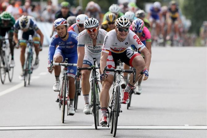 Andre Greipel (Lotto Belisol) outsprints John Degenkolb (Argon-Shimano) and Nacer Bouhanni (FDJ) to win the Brussels Cycling Classic