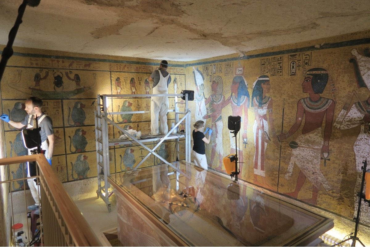 Conservators and archaeologists complete conservation work of the wall paintings in the burial chamber of King Tut&#039;s tomb in the spring of 2016.