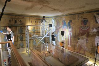 Conservators and archaeologists complete conservation work of the wall paintings in the burial chamber of King Tut's tomb in the spring of 2016.