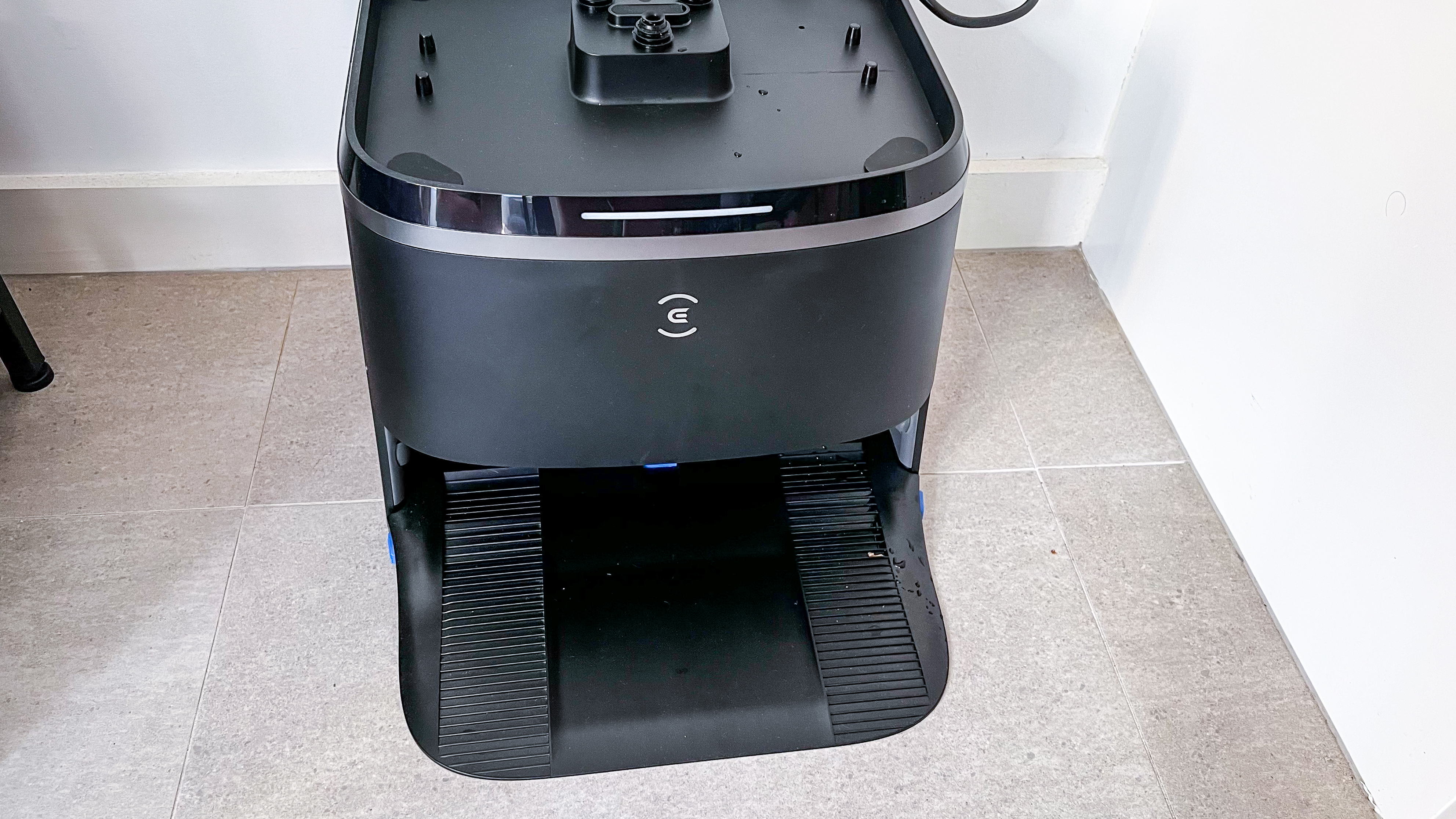 Ecovacs Deebot T30 Omni robot vacuum's docking station showing the wash tray