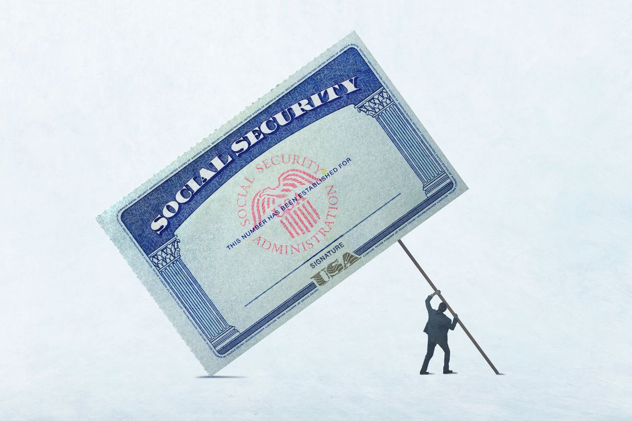 Man lifting a Social Security card