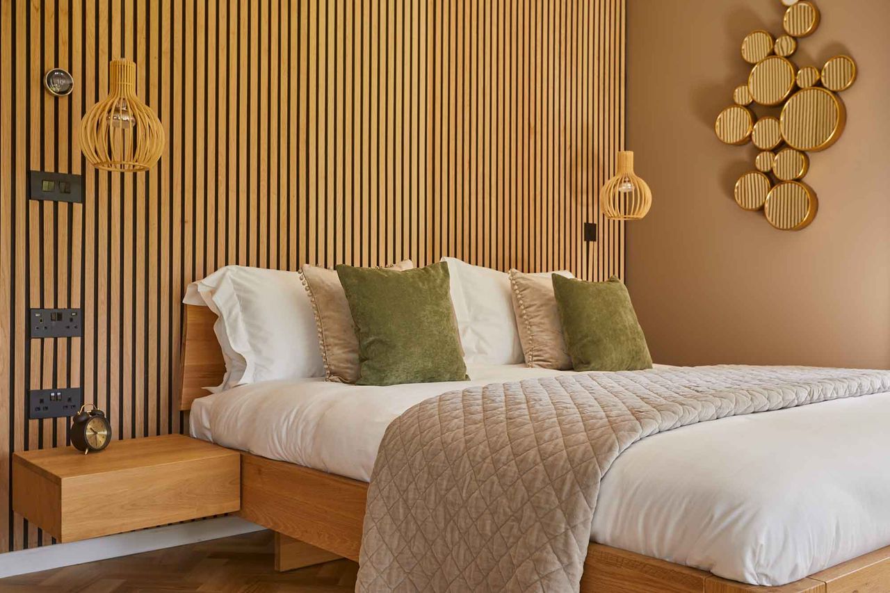 The bedroom of The Tawny's Primrose Retreat