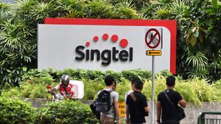 Singtel sign at the front of its office HQ