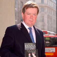 Ken Wharfe holding his book about Princess Diana