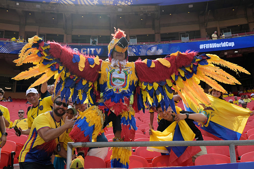 An Ecuadorian fan wearing a bird costume poses for a picture ahead of the 2026 World Cup Group E football match between Ecuador and Curacao. (Photo by JUAN MABROMATA / AFP)