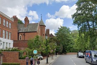 A shot of Tower house a red brick building as seen from the street