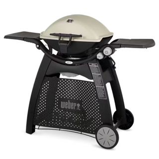 A Weber Q3200 grill on a white background