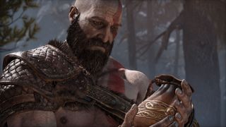 God of War Ragnarok PC, Kratos looking sadly at a pouch