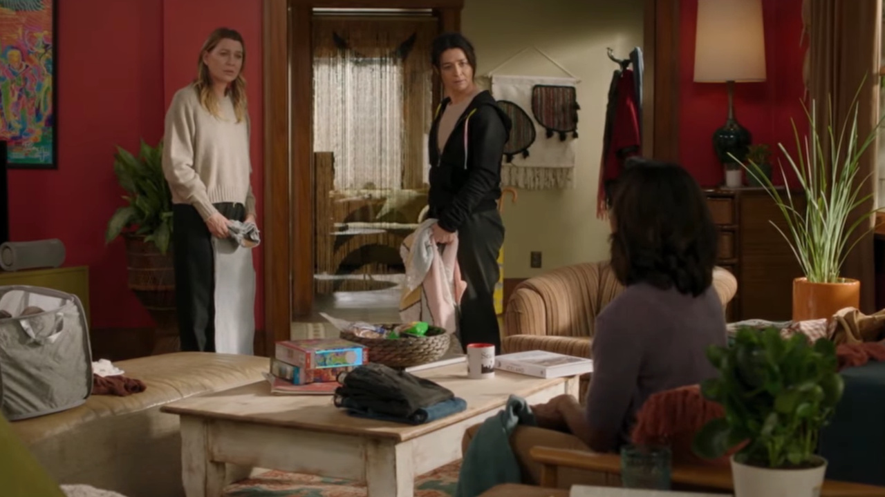 Meredith and Amelia look at Maggie in shock in the Grey&#039;s Anatomy Season 22 episode &amp;quot;We Built This City.&amp;quot;