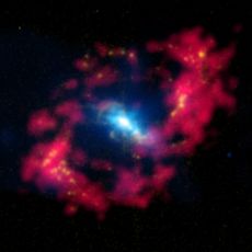 The supermassive black hole at the center of the spiral galaxy NGC 4151 has created a structure that astronomers call the "Eye of Sauron," after the evil wizard in J.R.R. Tolkien's "Lord of the Rings" novels. This image is a composite of images taken by s