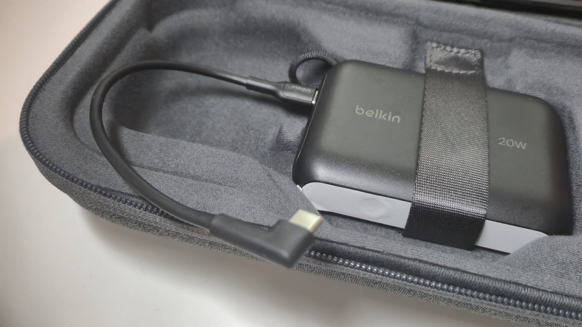 Photo by Rosalie Newcombe of the power bank sitting in the bottom of the Belkin Switch 2 case.