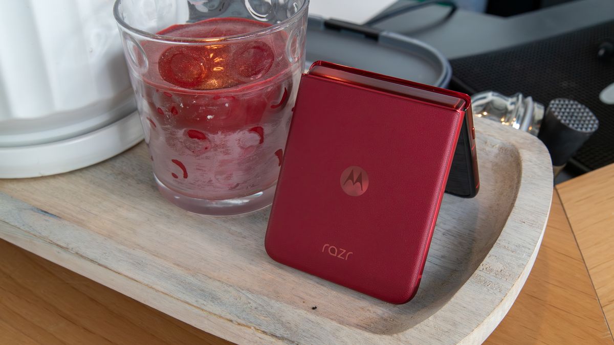 The Razr Ultra 2025 next to a red candle