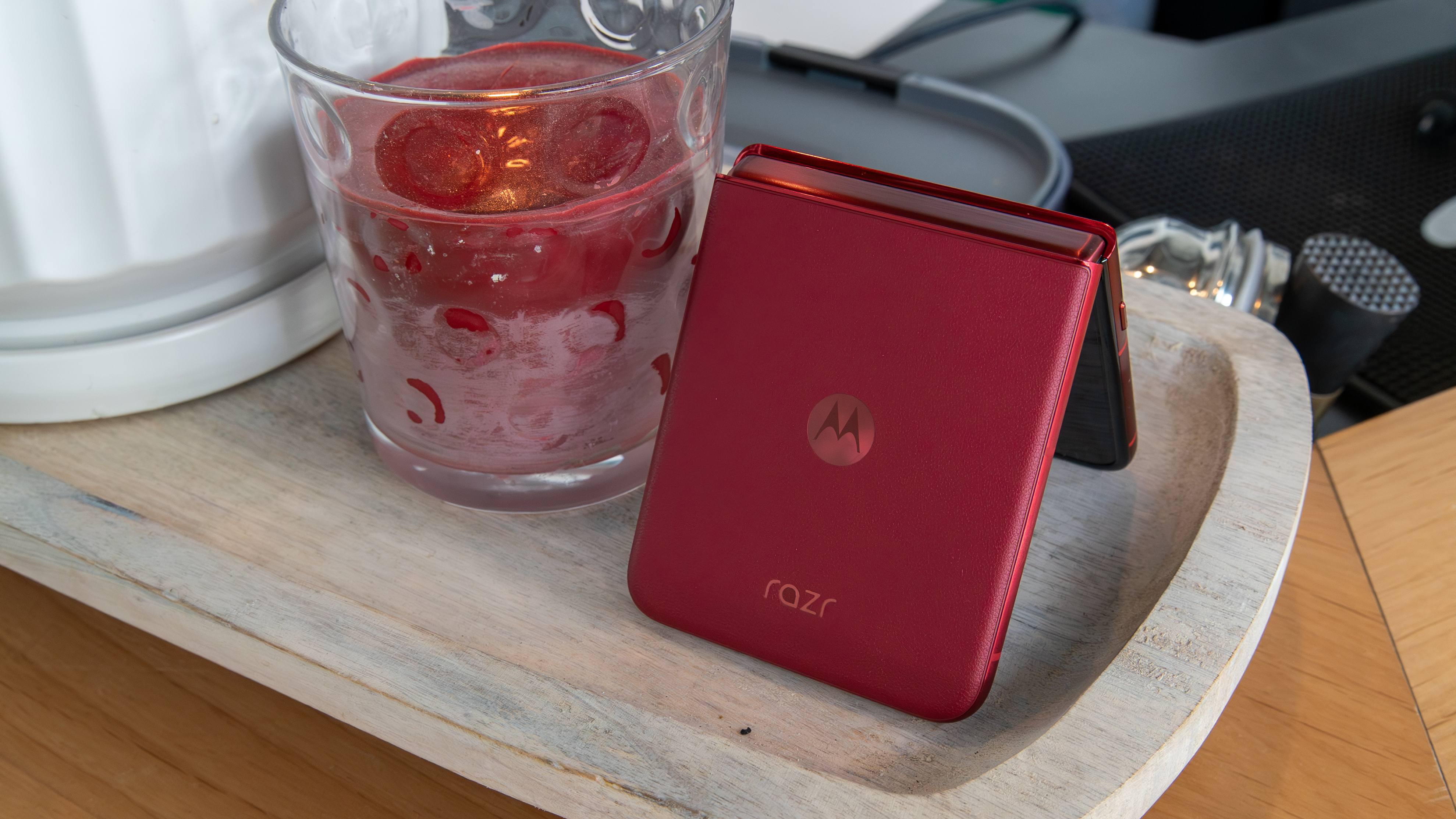 The Razr Ultra 2025 next to a red candle
