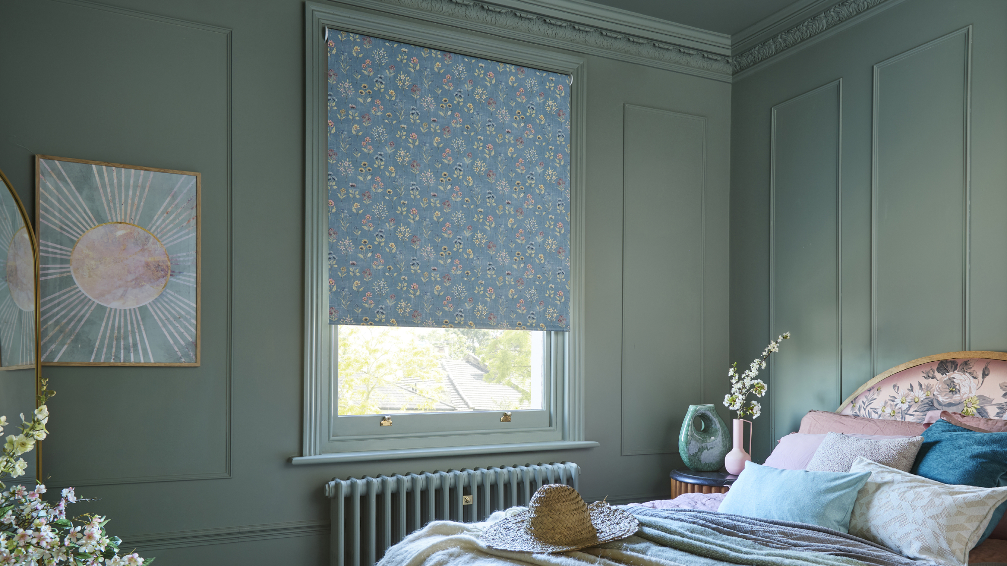 bedroom with walls, ceiling and woodwork painted in the same shade of soft teal