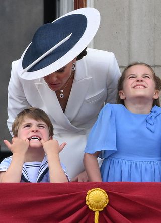 Prince Louis pulling a face on the Buckingham Palace balcony