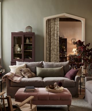 fall living room with cozy fabrics and plum purple accents