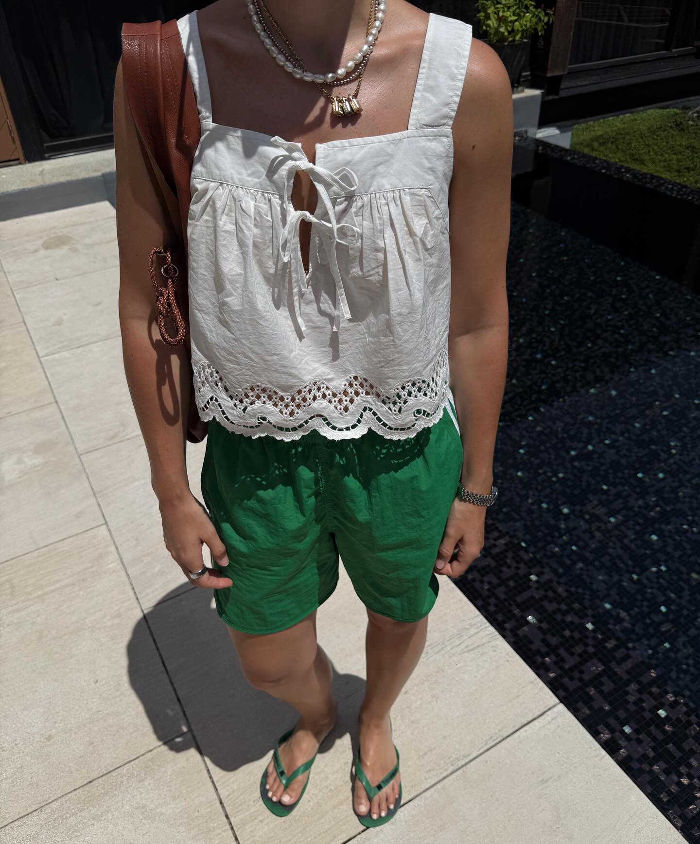 An image of @holliemercedes wearing a 2025 short trend.