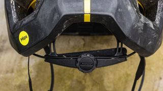 Close up of retention wheel on back of cycling helmet