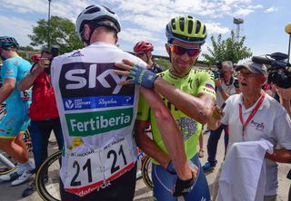 Chris Froome and Alberto Contador greet each other at sign on