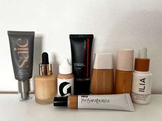 collection of skin tints on a shelf
