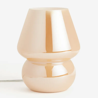 peach-colored glass mushroom table lamp