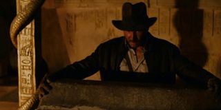 Harrison Ford next to a Star Wars Easter Egg in Raiders of the Lost Ark