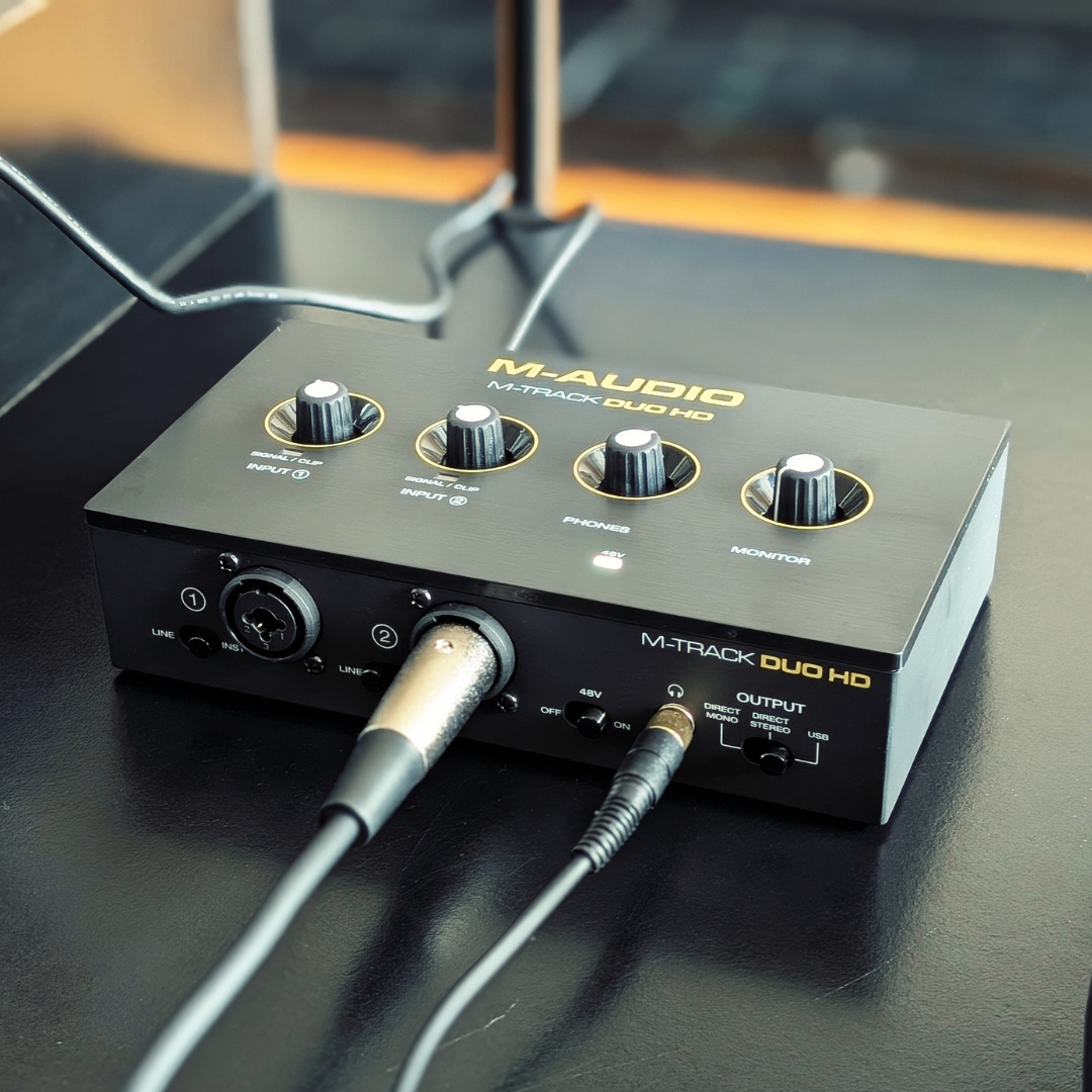 An M-Audio M-Track Duo HD audio interface on a table