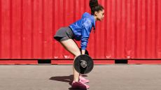 Woman lifting a barbell