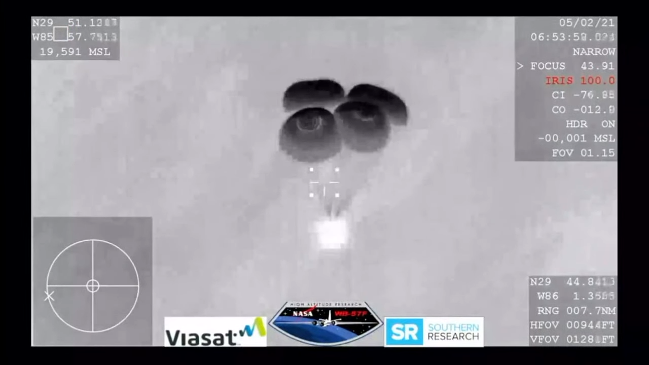 A view of the main parachutes, which deployed about three minutes before splashdown.