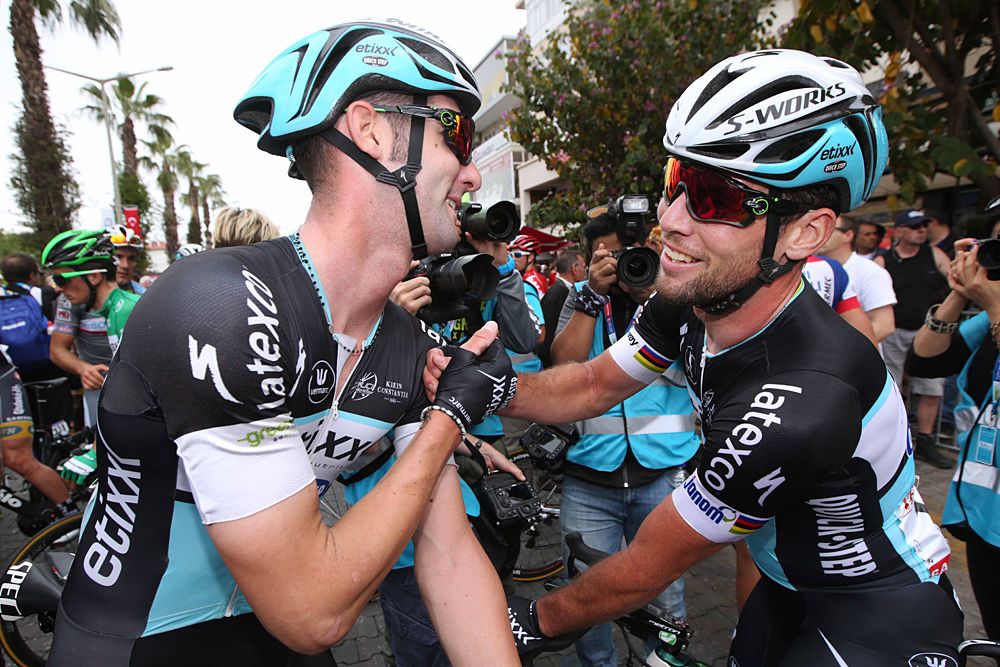 Mark Cavendish (Etixx-QuickStep) is congratulated by teammates