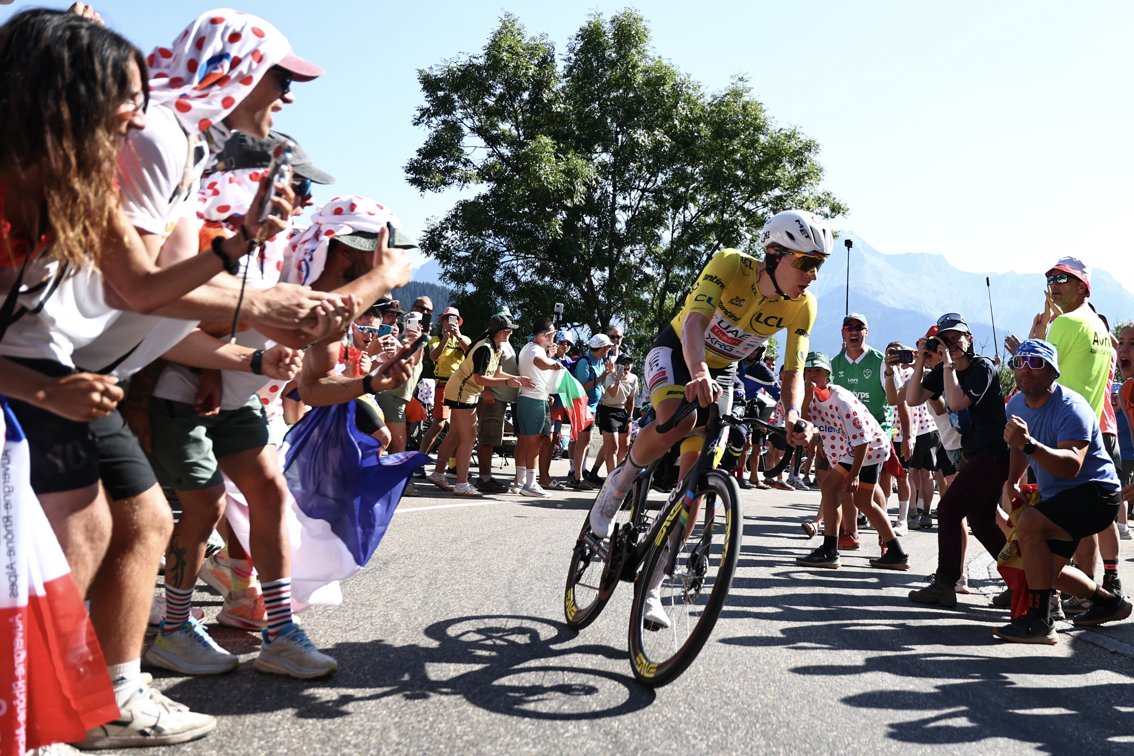 UAE Team Emirates - XRG's Slovenian rider Tadej Pogacar wearing the overall leader's yellow jersey